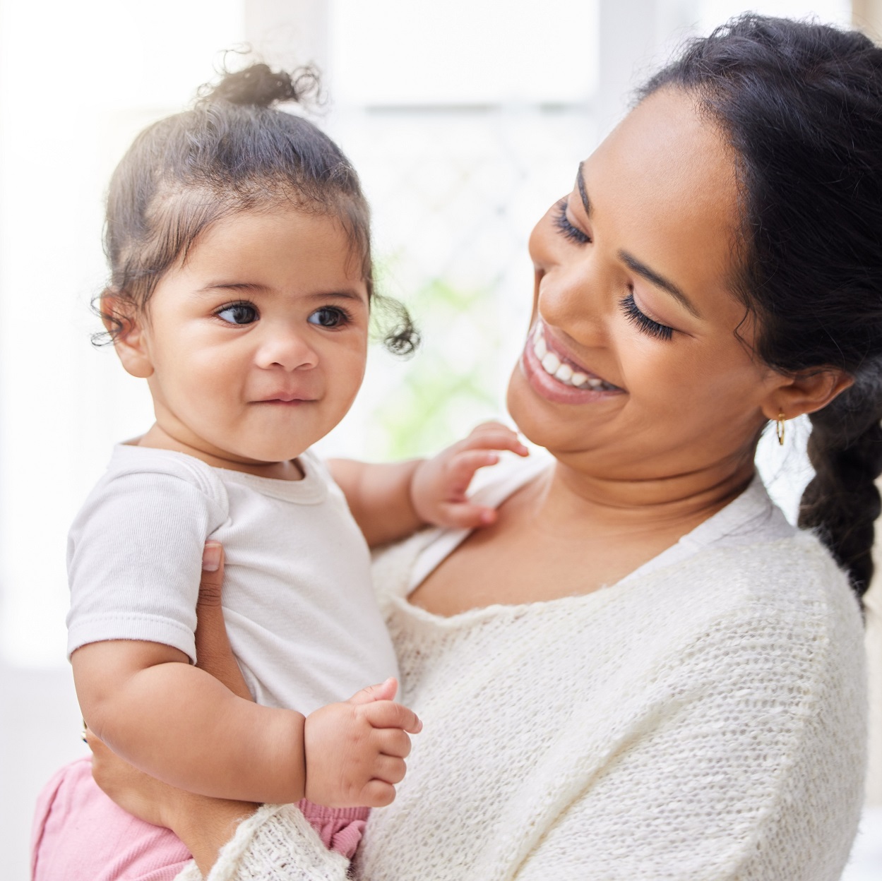 home hug mother with baby happines